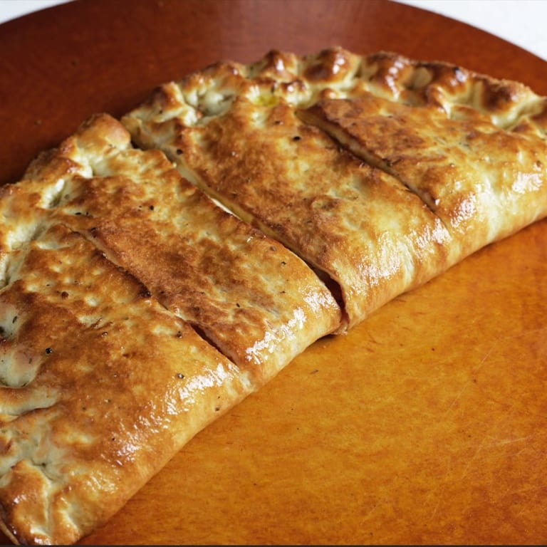 Savor Our Calzone Today