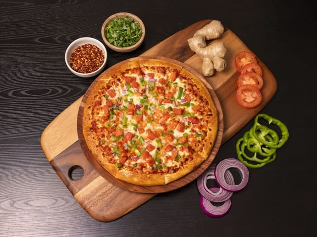 Butter Chicken Pizza.