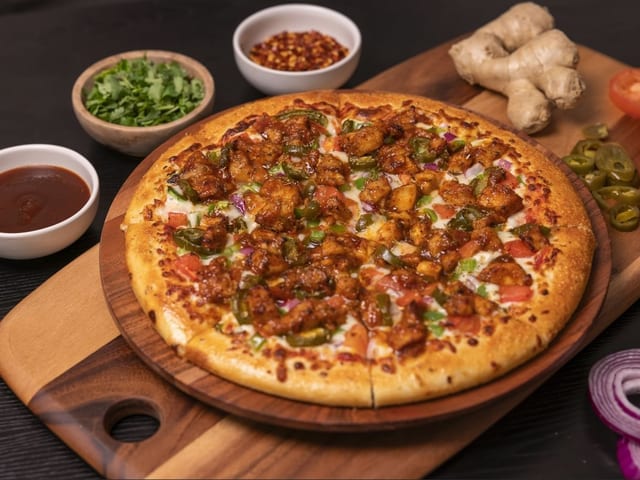 Halal Korean Chili Chicken Pizza.