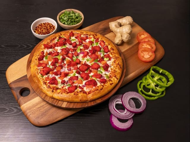 Halal Tandoori Chicken Pizza.