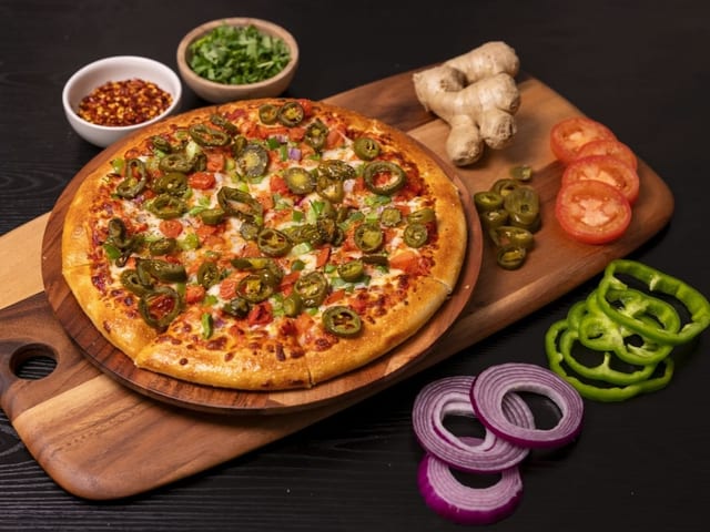 Butter Paneer Masala Pizza.