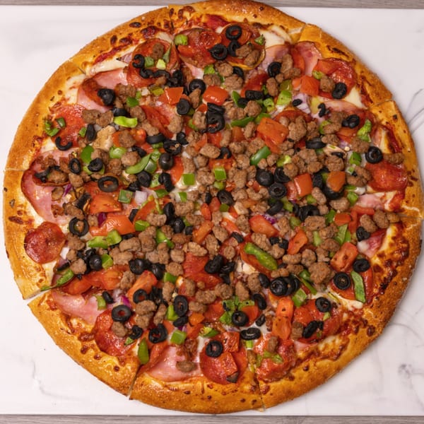 Can Am Pizza's large, round pizza with pepperoni, sausage, ham, olives, green peppers, and tomatoes.